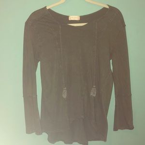 Long sleeve, green top.